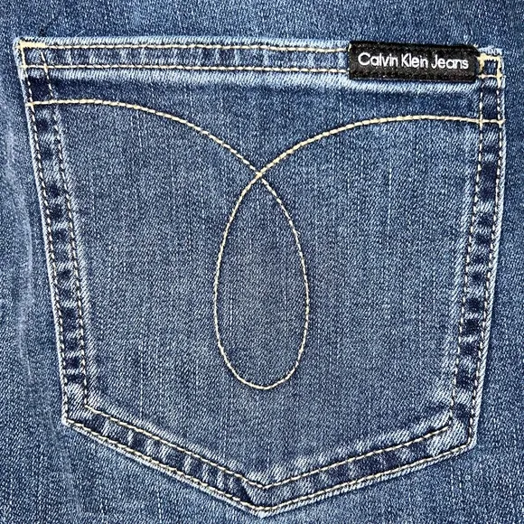 Calvin Klein sz 16W med blue wash zip up 2 button stretch High Rise Skinny Jeans