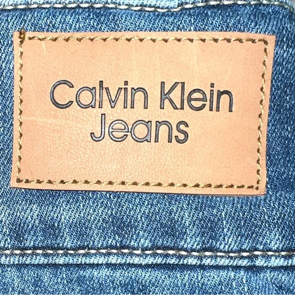 Calvin Klein sz 16W med blue wash zip up 2 button stretch High Rise Skinny Jeans