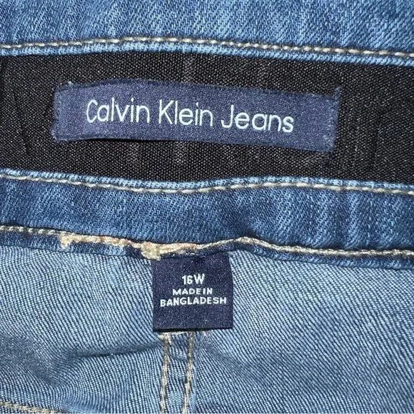 Calvin Klein sz 16W med blue wash zip up 2 button stretch High Rise Skinny Jeans